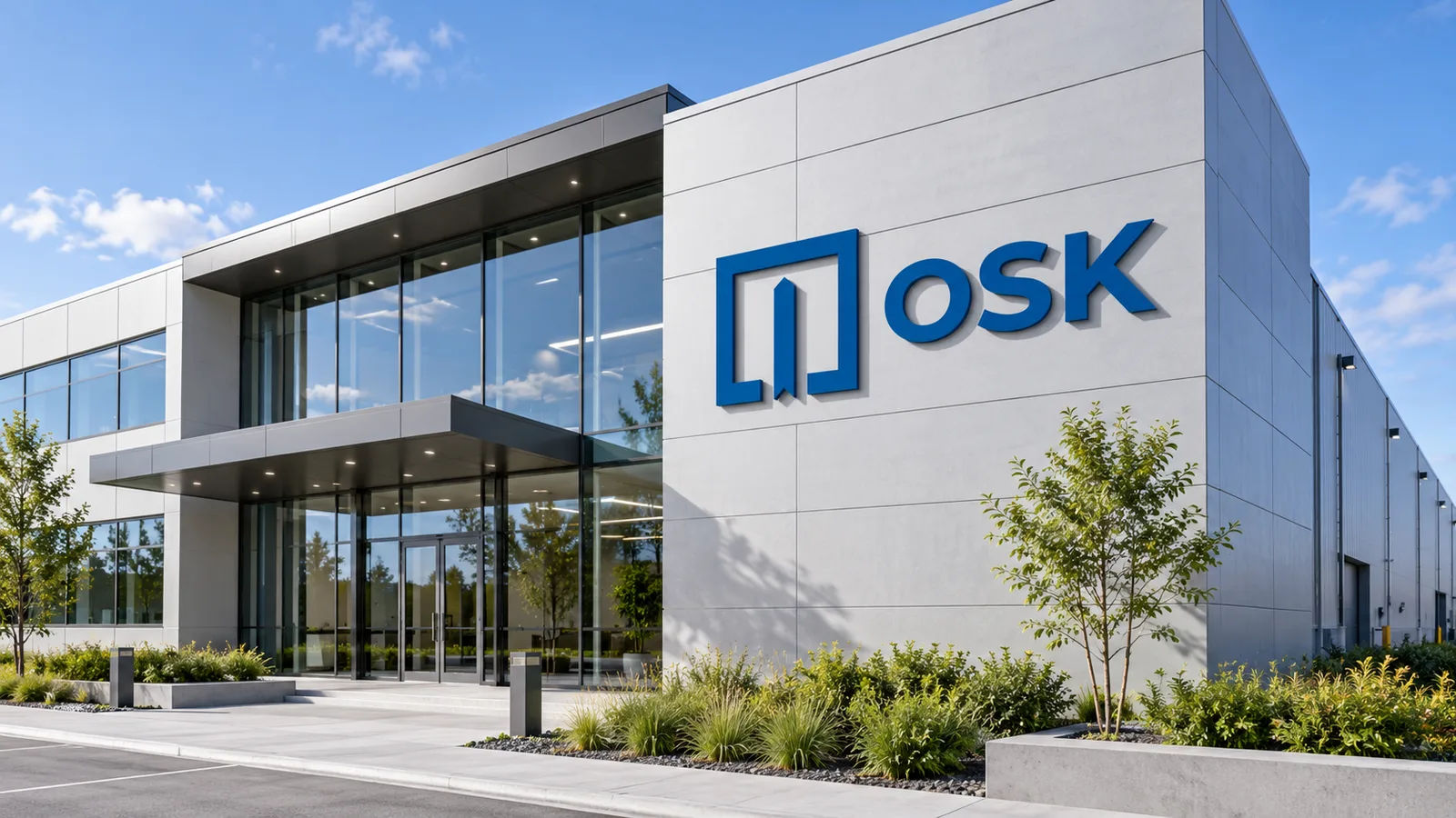 OSK logo on the facade of a modern industrial building