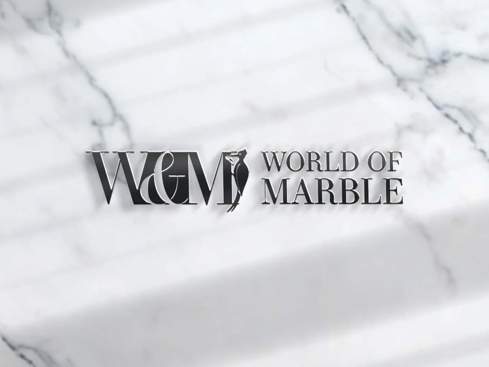 W&M World of Marble logo